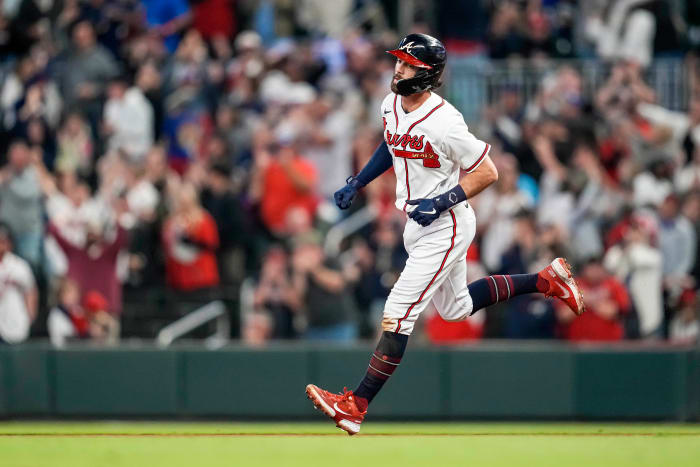 Braves shortstop Dansby Swanson runs the bases after hitting a home run.